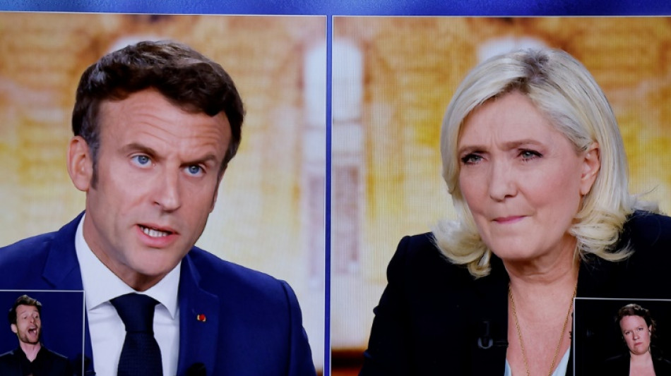 Pr&eacute;sidentielle: un dernier effort avant minuit pour Macron et Le Pen