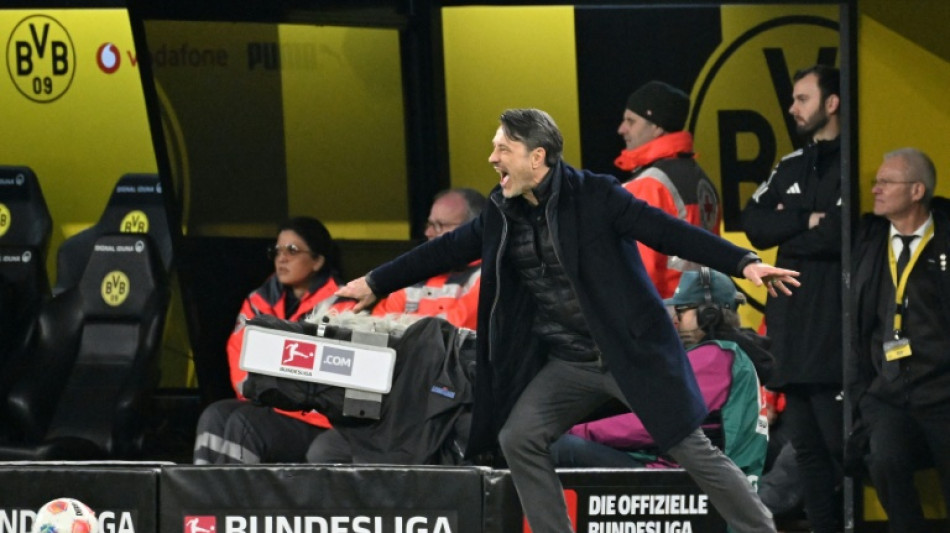 Dortmund dare to dream as Bayern's title march falters