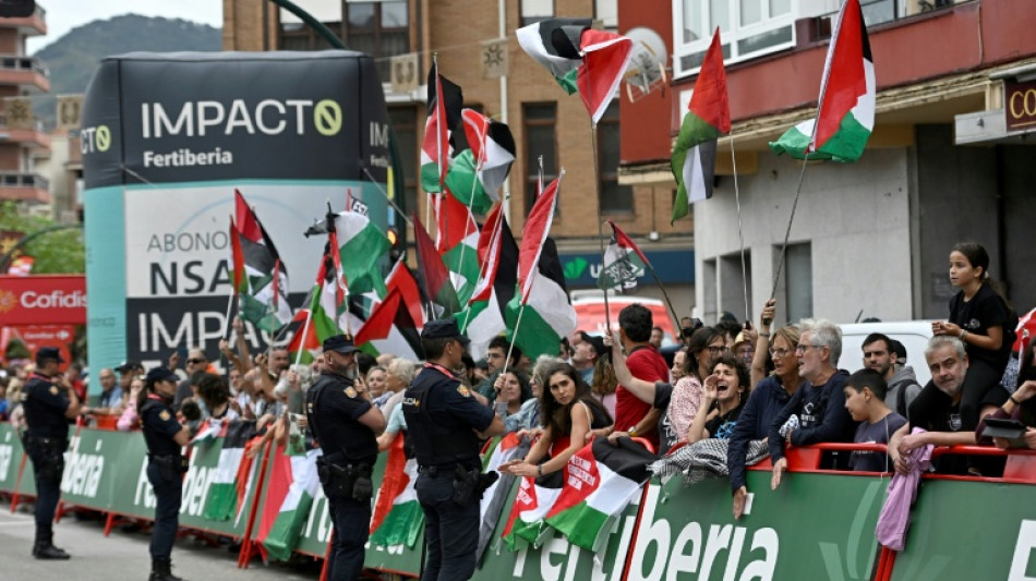 Ayuso sprints to Vuelta stage 12 victory as tensions ease