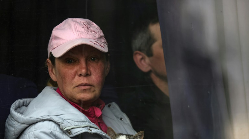 "Nous vivons ici maintenant": des villageois fuient les zones d'Ukraine occup&eacute;es par les Russes