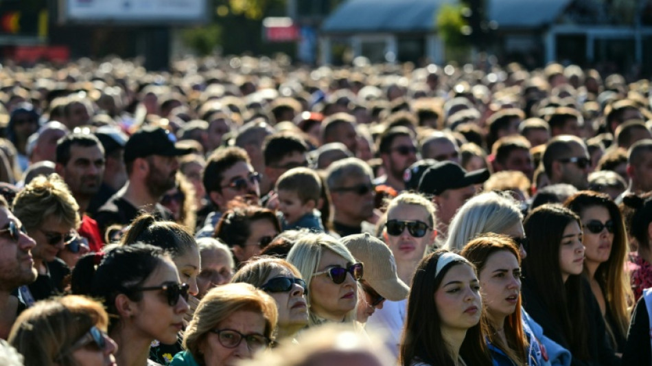 Tens of thousands of Serbians mark first anniversary of deadly train station collapse