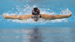McIntosh, Marchand close US Open with 200m fly victories