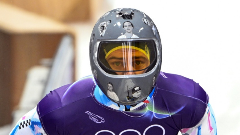 IOC to try to convince Ukrainian not to wear banned helmet