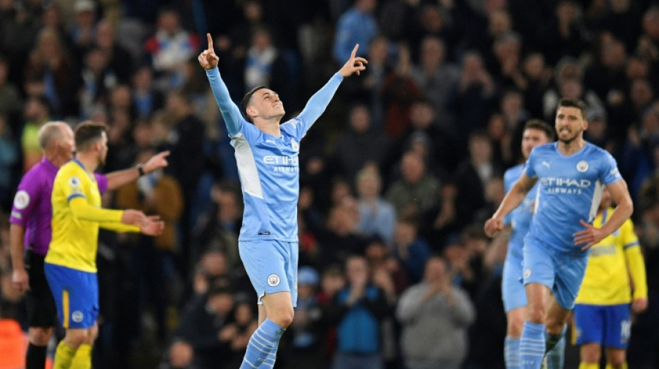 Man City beat Brighton to reclaim top spot