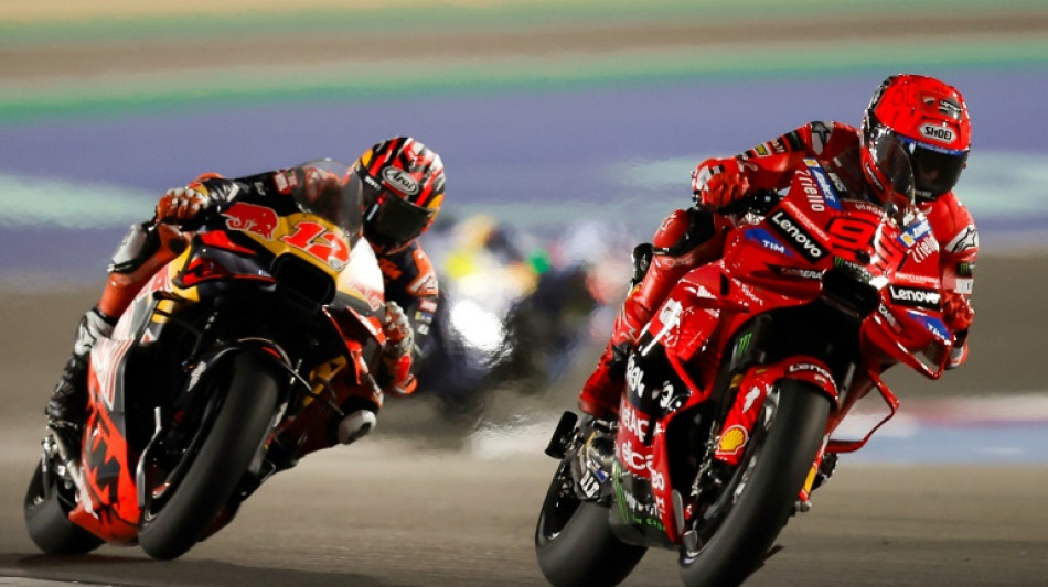 Marc Marquez survives brotherly shove to win Qatar MotoGP