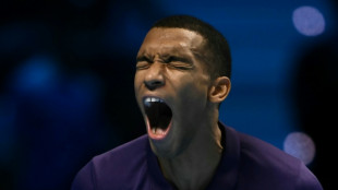 Auger-Aliassime beats Shelton to get off mark at ATP Finals
